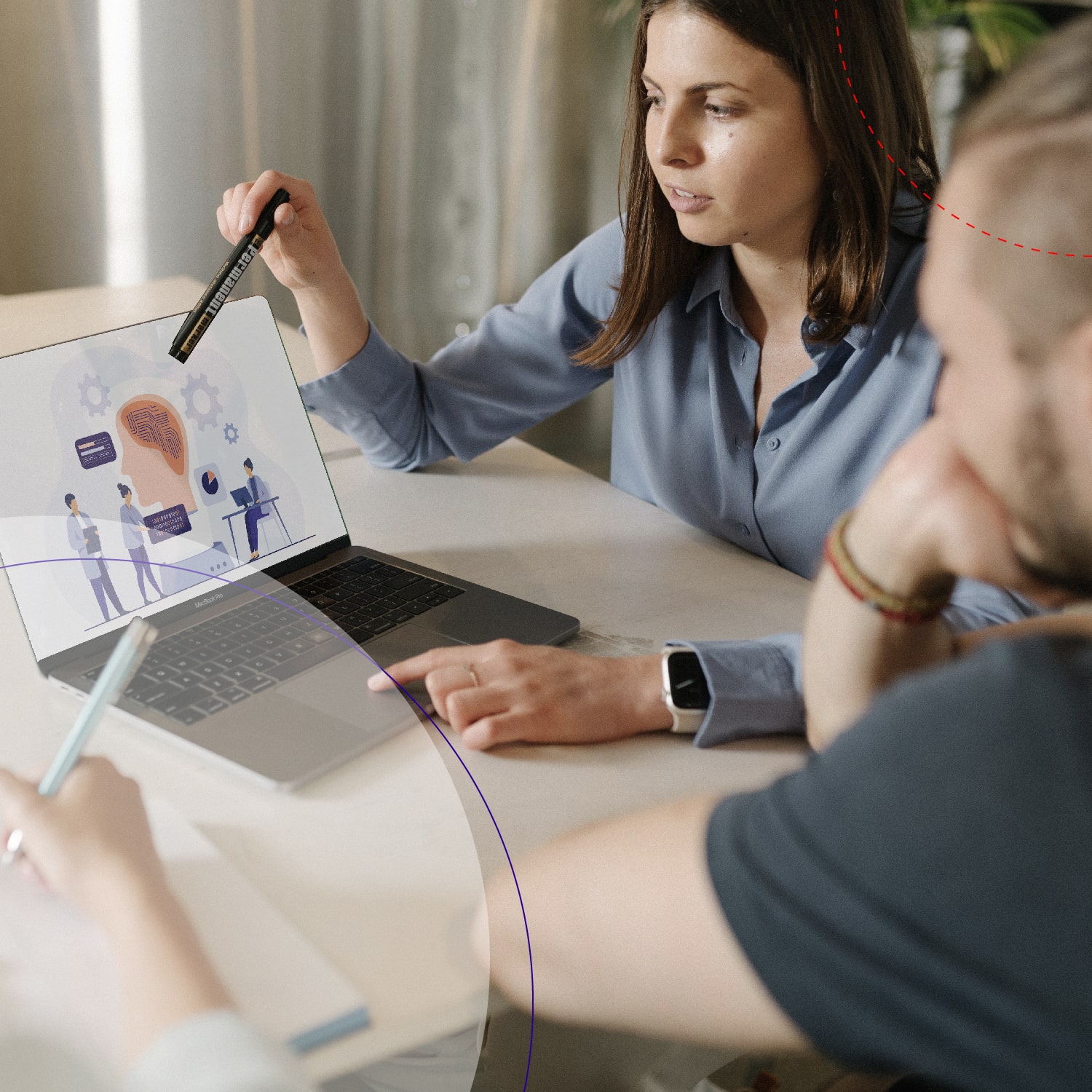 Darinka presenting to a colleague at a laptop