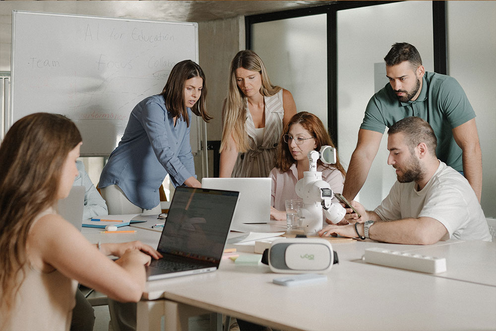 Team workshop around a laptop